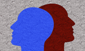 abstract image of a blue head overlapping a red head to symbolize personality disorders